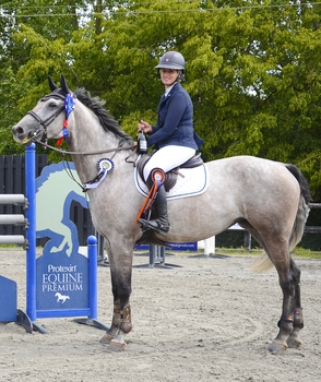 Nicole Pavitt lifts the Events Through A Lens Talent Seeker incorporating the 7-year-old Championship Qualifier at Codham Park